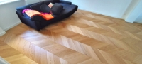 Realizacja w Gorzowie Wlkp. Dostawa i montaż jodełki francuskiej dębowej w eleganckim mieszkaniu