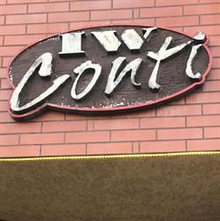 I.W. Conti. Sklep odzieżowy