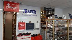 Traper. Sklep obuwniczy. Siryk J.