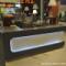 Lada solid surface do stoiska Coffee Station. Centrum Handlowe Forum Gliwice. Hi-Macs Concrete Grey.