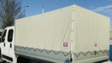 Plandeka na samochód dostawczy na wymiar z trwałego PVC do intensywnego transportu