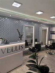 Vellis. Salon fryzjerski i solarium. Komsta A.