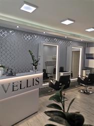 Vellis. Salon fryzjerski i solarium. Komsta A.