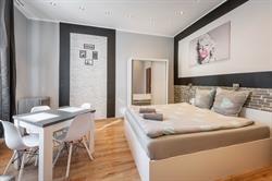 Queen Apartments