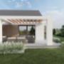 Pergola z meblami ogrodowymi wśród traw i lawendy