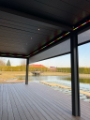 Pergola lamelowa z roletami ZIP i oświetleniem